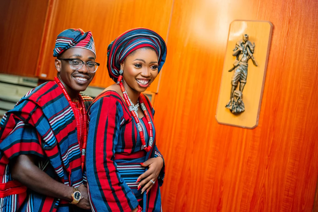 nigerian couple taking their traditional wedding portraits in hotel lobby by lagos wedding photographer, Ash Robin