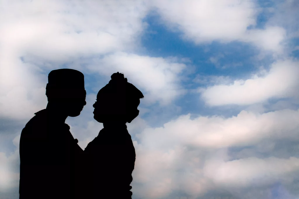 silhouette of a couple holding each other
 

